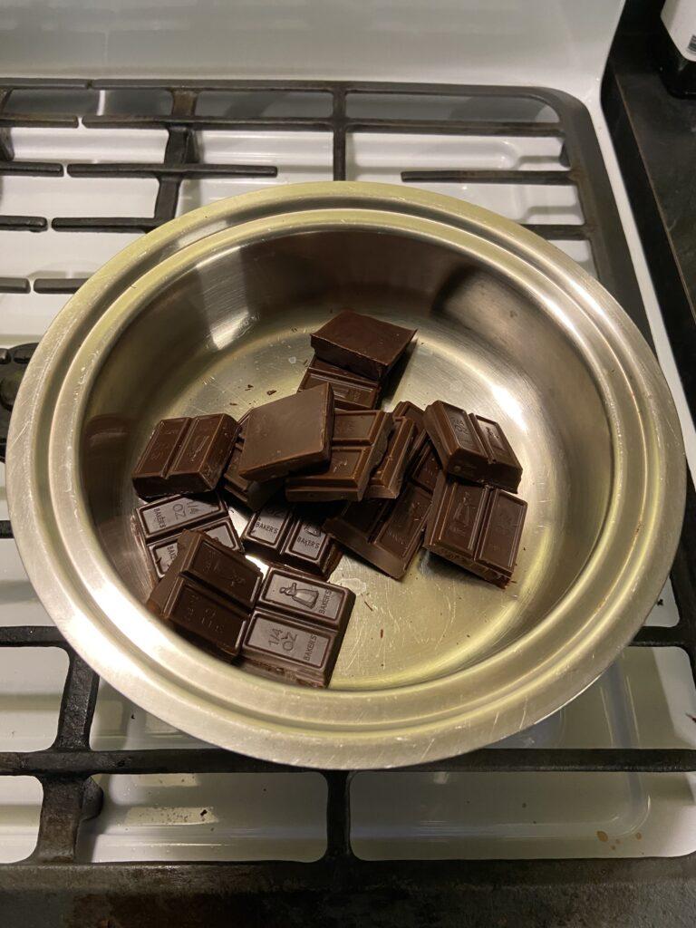 Levo Chocolate drops - chocolate squares in double broiler.