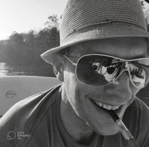 photo of Dustin, founder of Fat Nugs Magazine, wearing sunglasses styled like Hunter S. Thompson