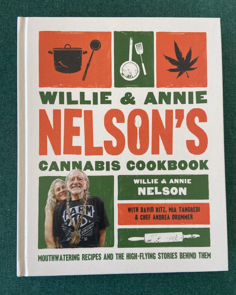 photo of the cover of the willie nelson cannabis cookbook, shows an image of willie and annie nelson