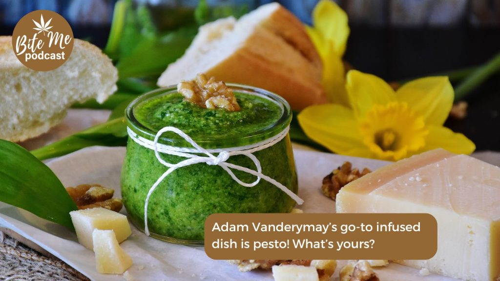 image of a tray holding a jar of pesto with a walnut on top as pesto is chef Adam Vandermay's go-to infused dish.