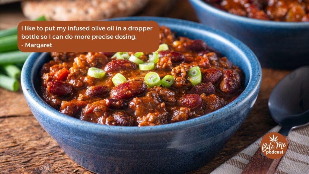 image of a bowl of sweet potato chili garnished with green onion, for the an episode on infused comfort food