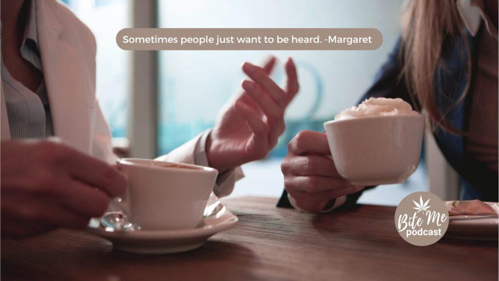 close up of two people having coffee at a table, close up of the coffee cups for the episode on how to talk about cannabis with friend and family episode.